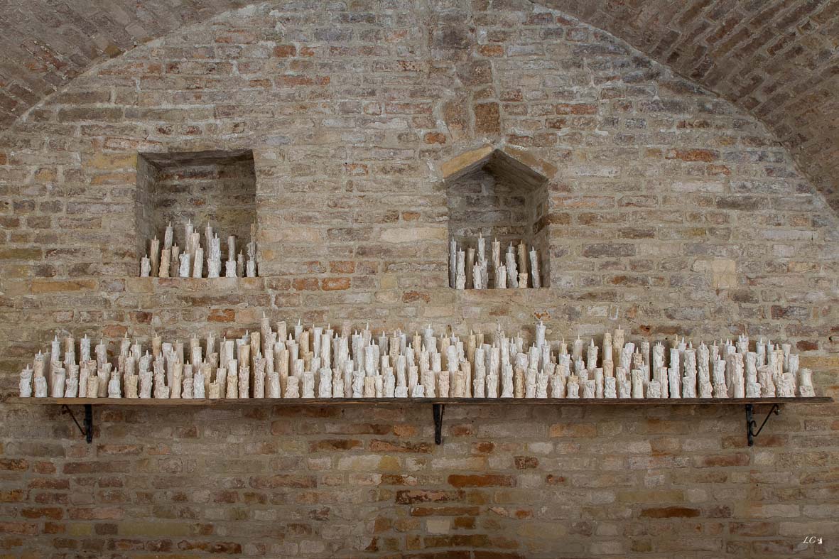 Santuario, 200 glazed ceramic candles, wood shelf, 2014